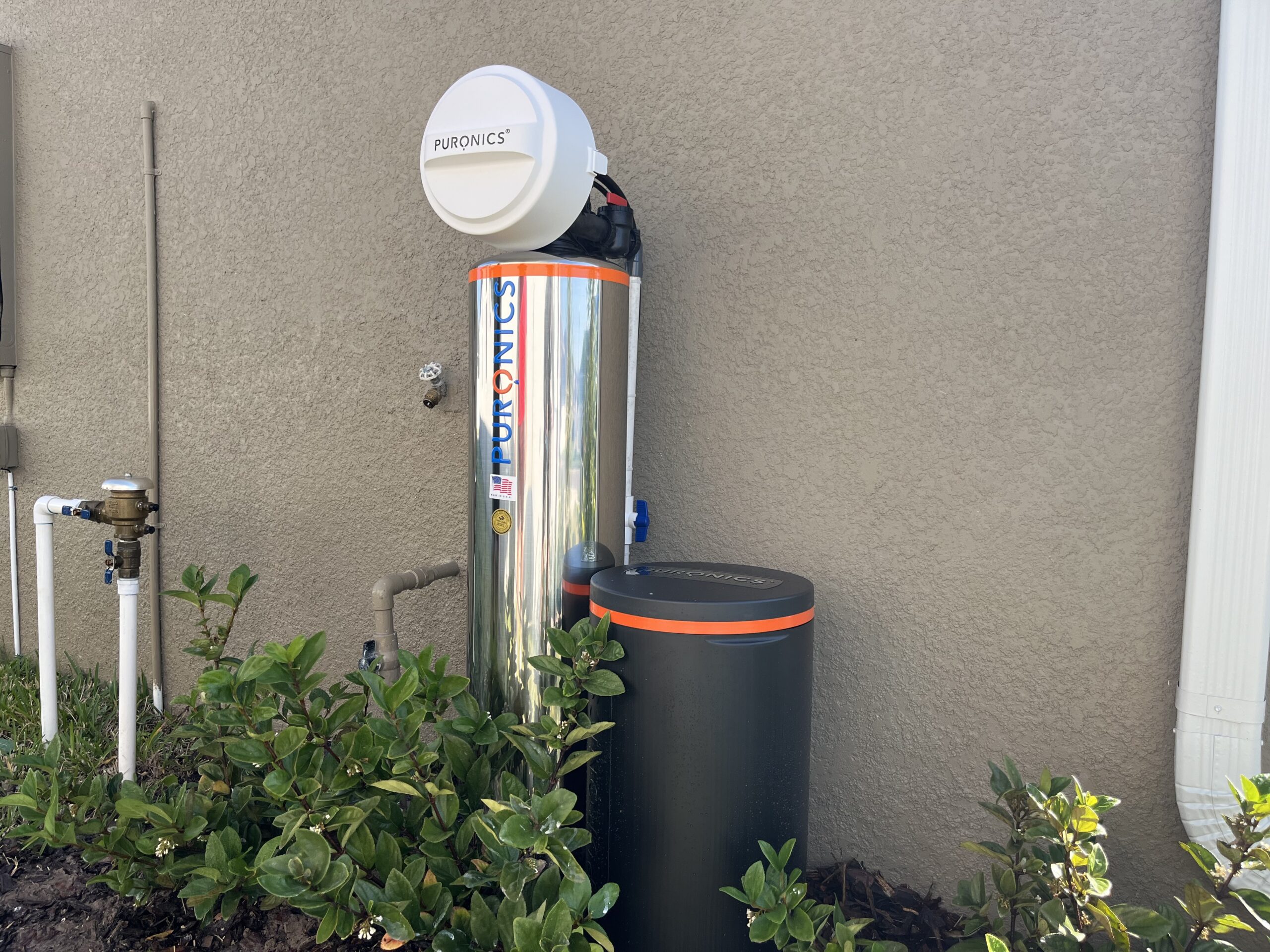 Puronics Hydronex stainless whole-home system with brine tank, installed by Hydrology