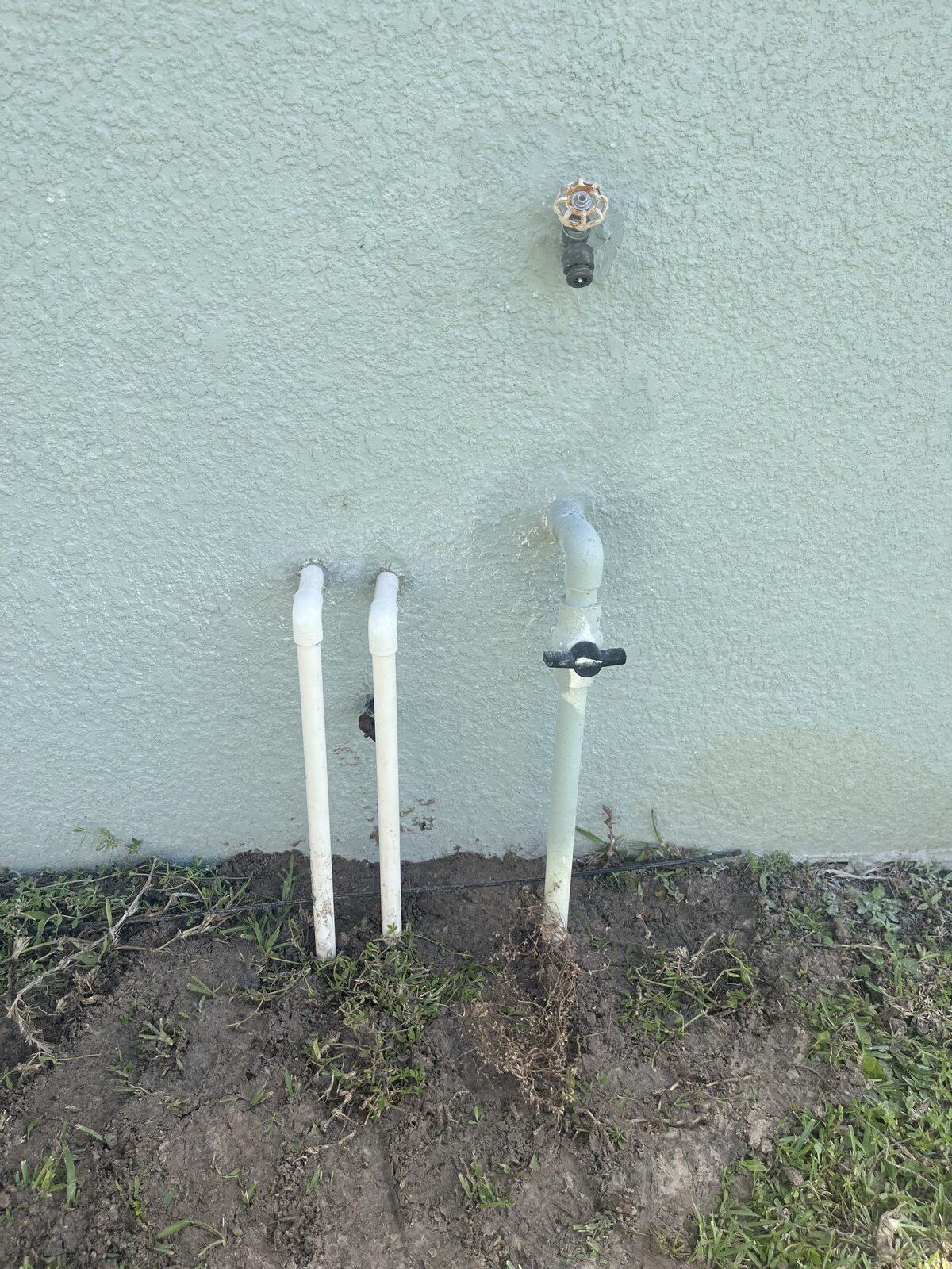 Clean, non-invasive water softener plumbing that blends with builder plumbing