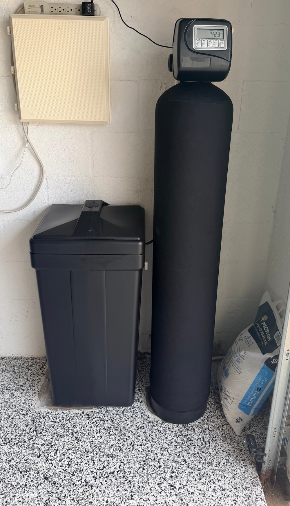 Hydrology Essentials water softener and brine tank installed in a Lakewood Ranch garage