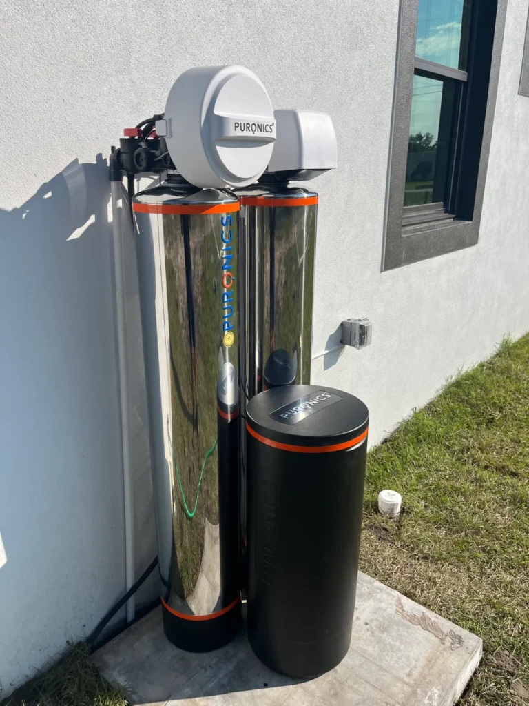 Twin stainless Puronics whole-home system installed and serviced by Hydrology Water Solutions