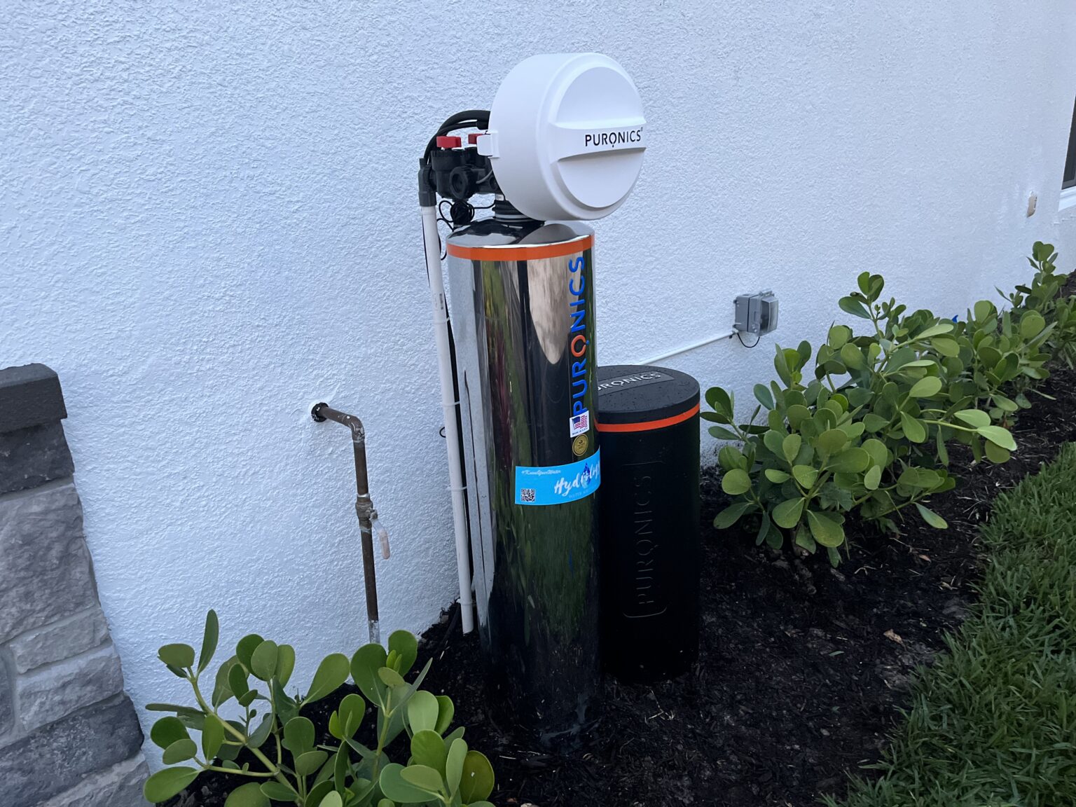 Puronics Hydronex iGen C installed outside a Bradenton-area home by Hydrology Water Solutions