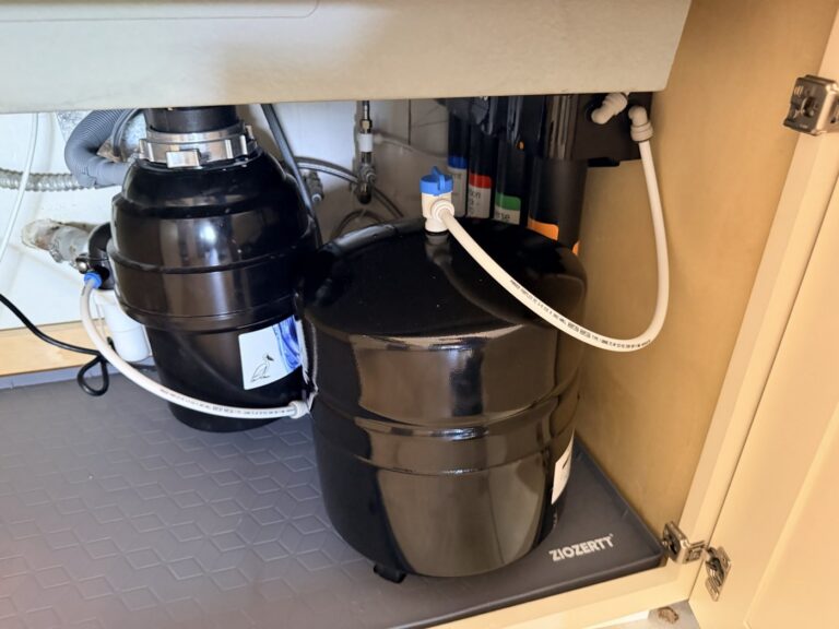 Puronics Micromax 8500 reverse osmosis system under a kitchen sink in St. Petersburg