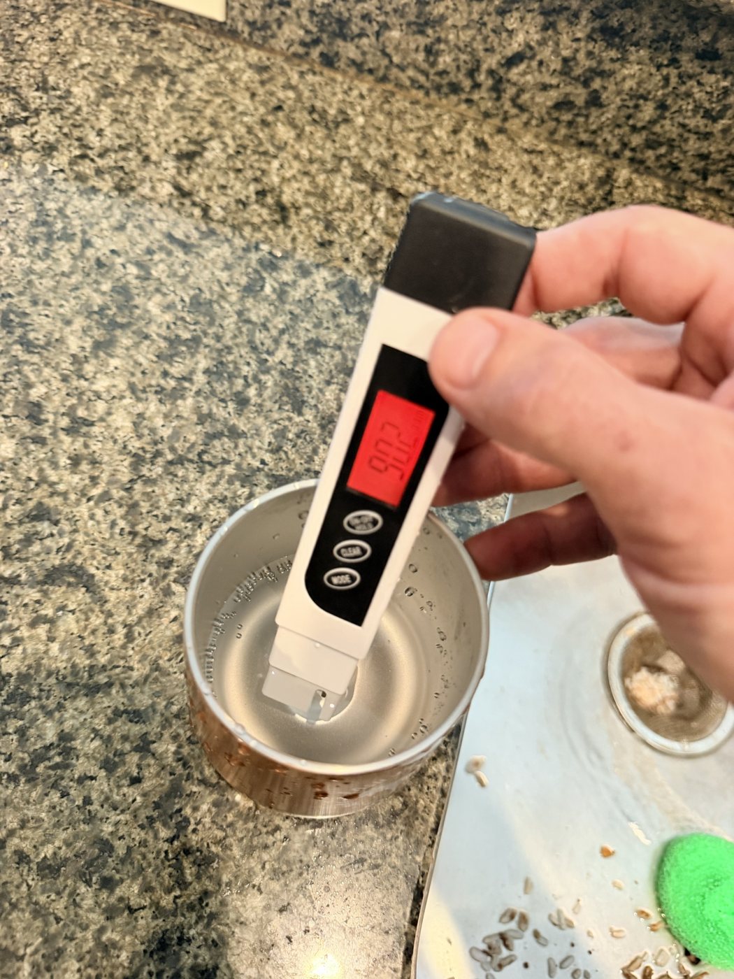 TDS meter reading 902 ppm during a well water test in North Port